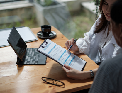 healthcare professional reviewing treatment costs with a patient